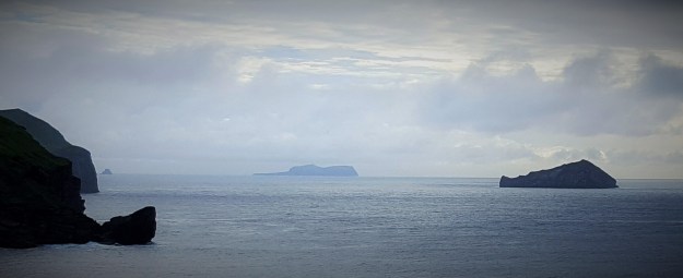 Center, The island of Surtsey in the Westman Islands, Iceland.